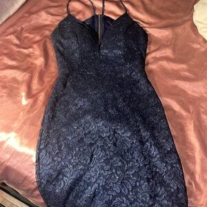 Emerald Sundae evening dress. Short, spaghetti strap, open back.